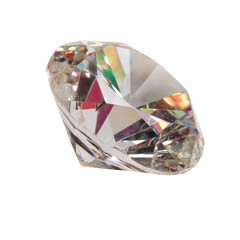 Close-up of a brilliant crystal gem showcasing vivid reflections and intricate facets in high detail and clarity