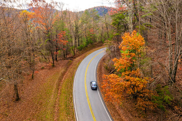 Blue Ridge Parkway in full autumn splendor. North Carolina mountain highway lined with brilliant...
