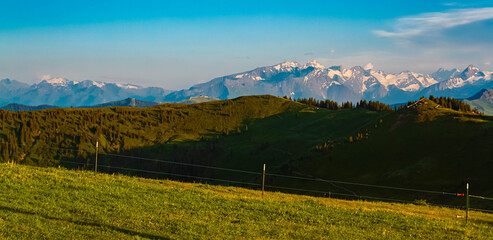 Alpine summer evening view with a far view of the Hohe Tauern mountains seen from Mount Asitz, Leogang, Zell am See, Pinzgau, Salzburg, Austria