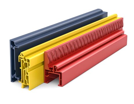 Colorful plastic window profiles arranged on white background