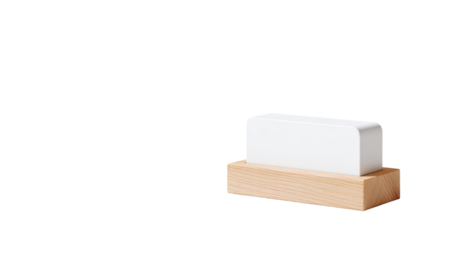 White rectangular object atop a light-brown wooden base