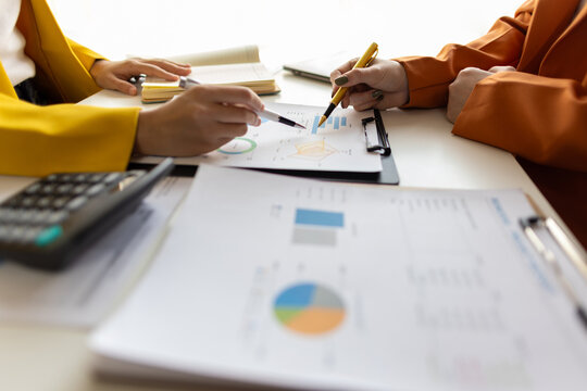 Businesswoman meeting with consultant discussing financial situation analysis in business and marketing report. Financial planning, accounting and business strategy.