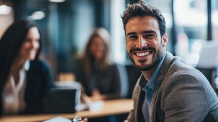 A young professional displays enthusiasm during a job interview, smiling confidently and engaging actively with the panel in a modern office