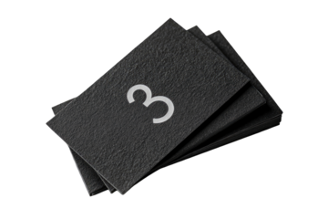 Stack of dark gray business cards, textured surface, with a white '3' logo
