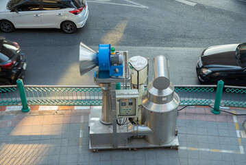 The Water spray robot for treatment the air from PM 2.5. JET VENTURI SCRUBBER ERIG. Ginormous Air Purifier machine installed on footpath in Bangkok, Thailand..