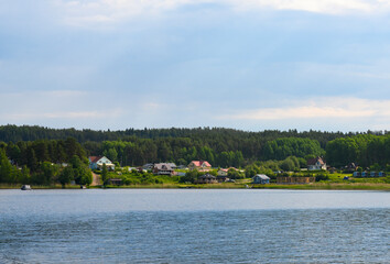 View of a village on the shore of Lake Ladoga in Karelia in summer