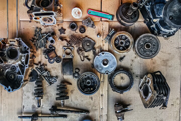 Old parts of motorcycles background. Repair and maintenance old parts of engine. Old motorcycle...