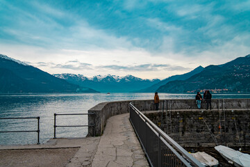 Scenic Lake with Snow-Capped Mountains in the Background