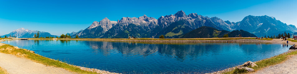 High resolution stitched alpine summer panorama with reflections at Lake Prinzensee, Mount Natrun,...