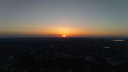 Aerial view of city landscape at sunset