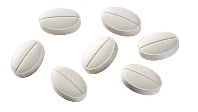 Seven oval white pills with a dividing line isolated on transparent background