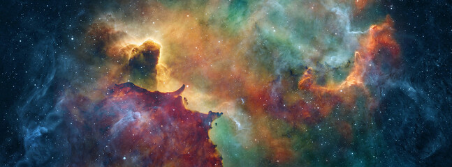 A view from space to a galaxy and stars. Universe filled with stars, nebula and galaxy,. Panoramic shot,. Elements of this image furnished by NASA. © Tryfonov
