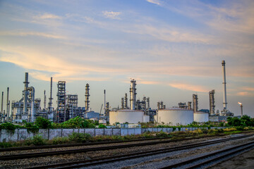Fototapeta premium Oil and Gas Industrial zone,The equipment of oil refining,Close-up of industrial pipelines of an oil-refinery plant,Detail of oil pipeline with valves in large oil refinery.