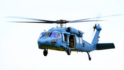 Fototapeta premium Military helicopter in flight against a bright white sky with blurred rotor blades