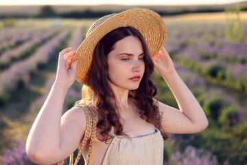 Portrait of beautiful young woman in lavender field