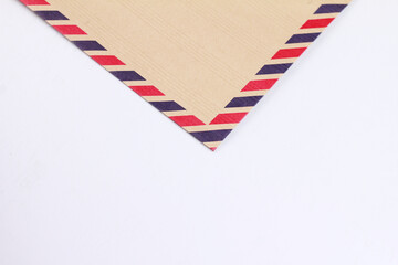 Obraz premium Close up of an antique envelope on a white background.