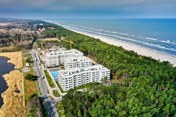 Construction site expanding seaside hotel overlooking baltic sea near kolobrzeg, poland