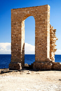 Big stone arch showing the mediterranean sea in tunisia, north africa