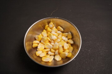 Sweet Corn : Corn kernels are small maize fruits containing a hard shell, dense starch-filled endosperm, and embryo germ essential for growth
