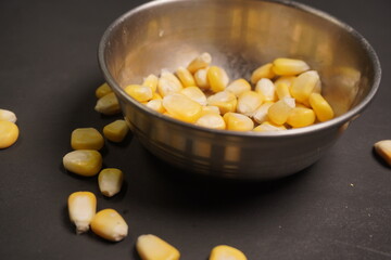 Sweet Corn : Corn kernels are small maize fruits containing a hard shell, dense starch-filled endosperm, and embryo germ essential for growth