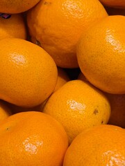 close up sunkist oranges on the market