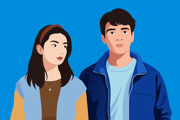 Young couple poses together against a vibrant blue background