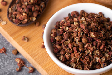 Chinese pepper, Sichuan pepper in bowl. Dry Sichuan Pepper Spice.	