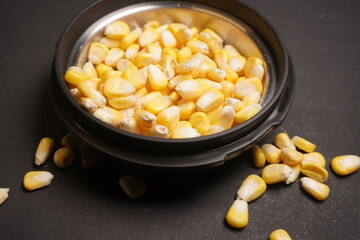 Sweet Corn : Corn kernels are small maize fruits containing a hard shell, dense starch-filled endosperm, and embryo germ essential for growth