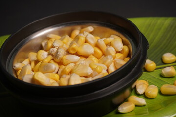 Sweet Corn : Corn kernels are small maize fruits containing a hard shell, dense starch-filled endosperm, and embryo germ essential for growth