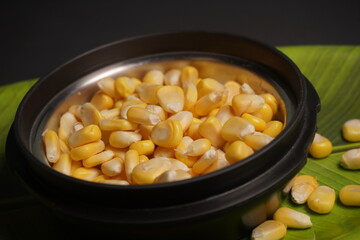 Sweet Corn : Corn kernels are small maize fruits containing a hard shell, dense starch-filled endosperm, and embryo germ essential for growth