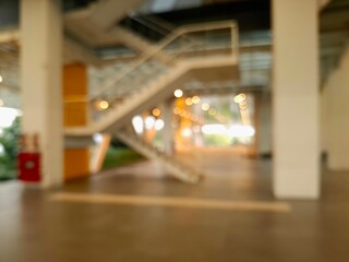 Blurry and unfocused photo of steel stairs in the afternoon. Photo composition: eye level view perspective.