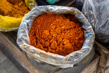 A bunch of Turmeric powder. Many have become a pile together and look like the background