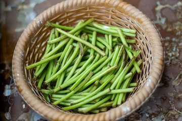 Many small vegetables in a basket