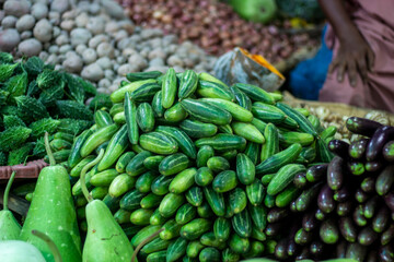 Many Pointed gourd in a bamboo basket at the market