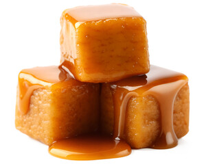 Caramel candies and caramel sauce isolated.