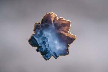 Obraz premium Captivating cosmic landscape showcasing celestial bodies in a mesmerizing texture hovering against a blurred background creating an ethereal visual dimension captured with clarity