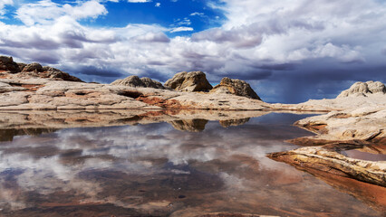 White Pocket in Utah, USA, a remote ecpanse of Navajo sandstone sculpted by wind and erosion into...