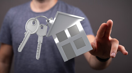 Person holding house keys and keyring.  Ideal for real estate, home buying, or property concepts.