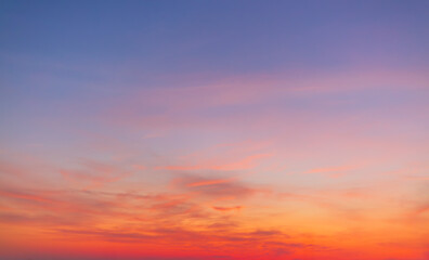 Colorful sky and clouds backdrop in the morning,Beautiful Vivid sky painted by the sun leaving bright golden shades.