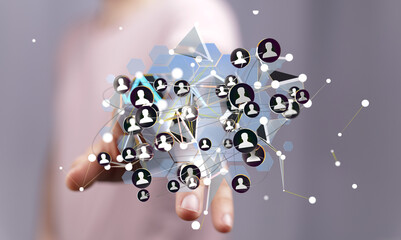 Hand interacting with a digital network of interconnected people, representing social media, global...