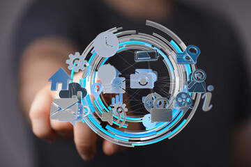 Hand interacting with a digital interface showcasing various app icons and connections.
