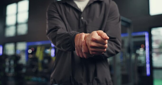 Wrist pain, fitness and hands of man in gym with injury, discomfort and hurt for workout, training and exercise. Sports, health and person with joint ache, strain and inflammation for accident