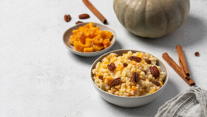 Rice millet porridge with pumpkin and cinnamon. Healthy breakfast. Copy space