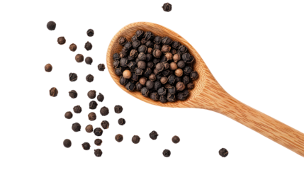 Black pepper falling from wooden spoon on transparent background