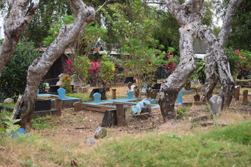 typical Javanese gravestones. A picture of a Javanese cemetery area.