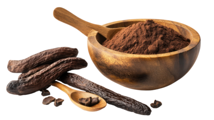 Carob in a wooden bowl and spoon on transparent background
