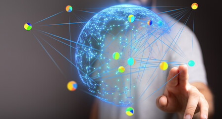 Abstract image of a person interacting with a digital globe, illustrating global connectivity and data flow.