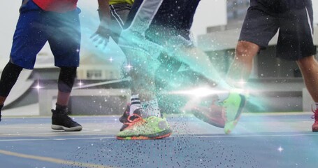 Two players dribbling on rooftop court activating particle effect while friends sprinting for ball - Powered by Adobe