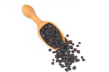 raisins in a scoop isolated on white background