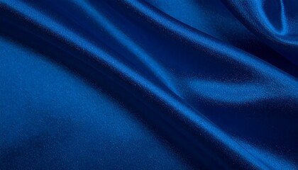 Fototapeta premium Close-up of deep blue satin fabric